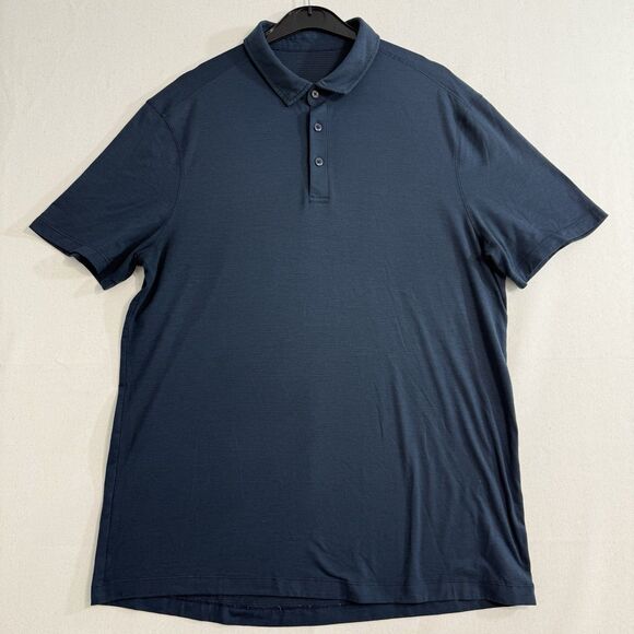 Lululemon Evolution Polo Short Sleeve Size Medium Navy Blue *has small hole - Picture 1 of 8